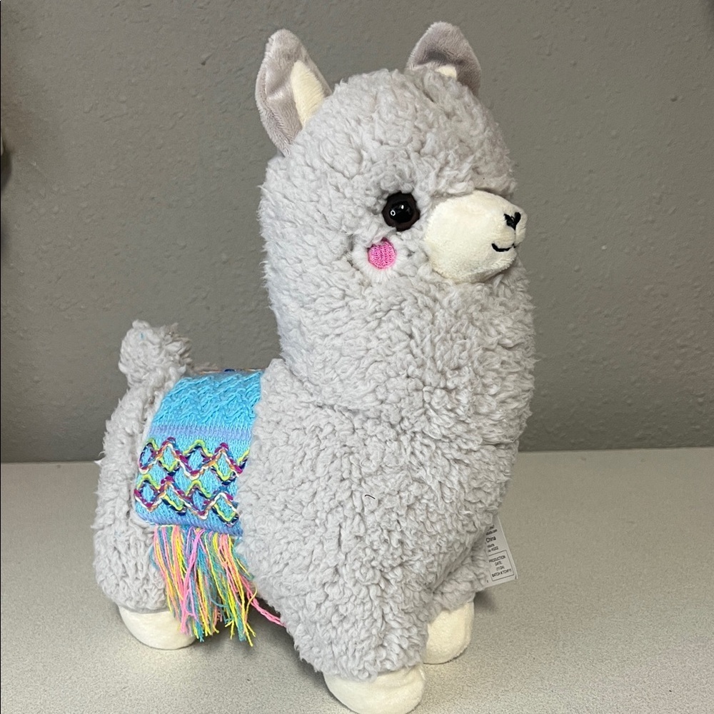 Gray Plush Llama with Blue Blanket